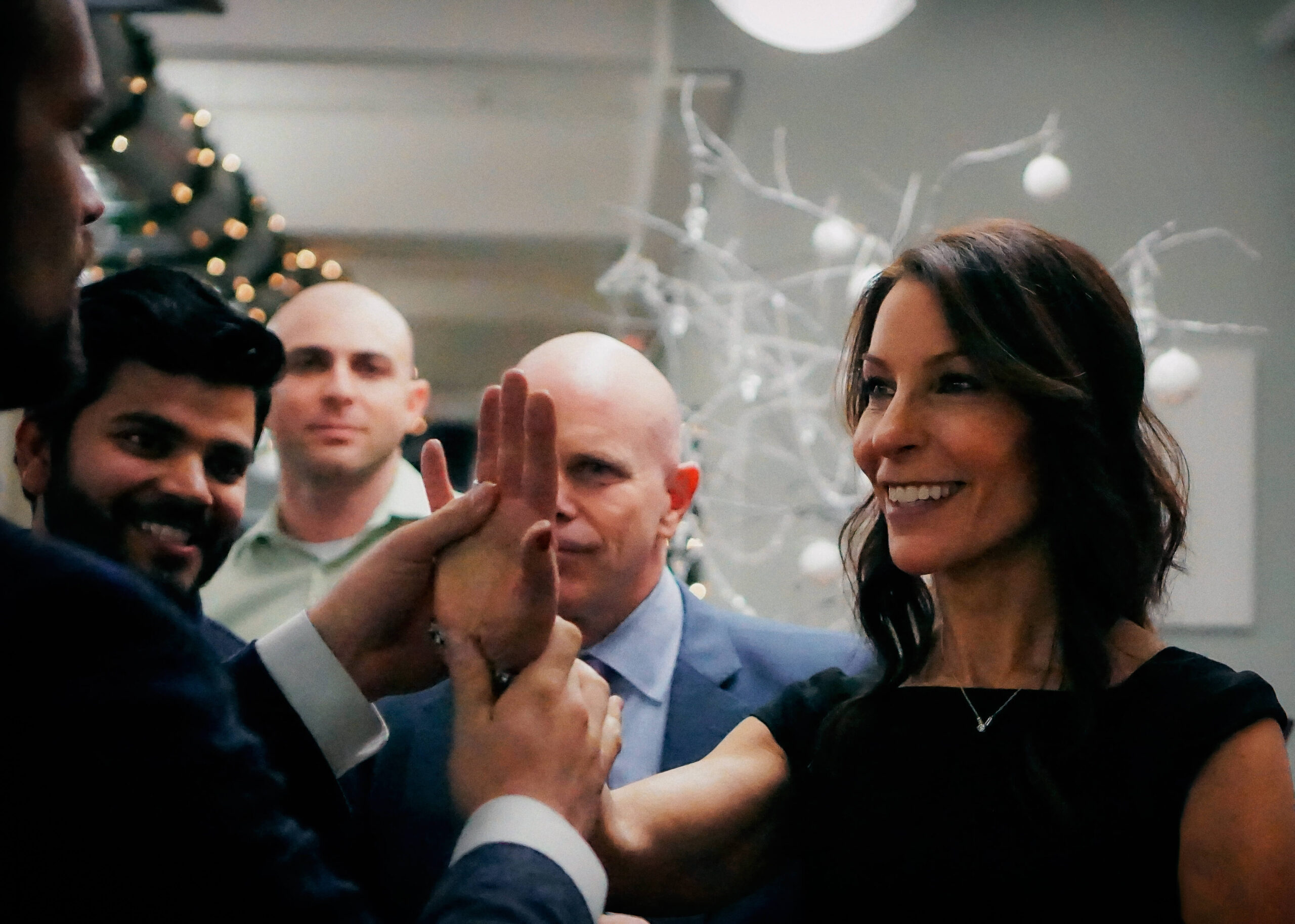 A guest reacting during a holiday party close-up set