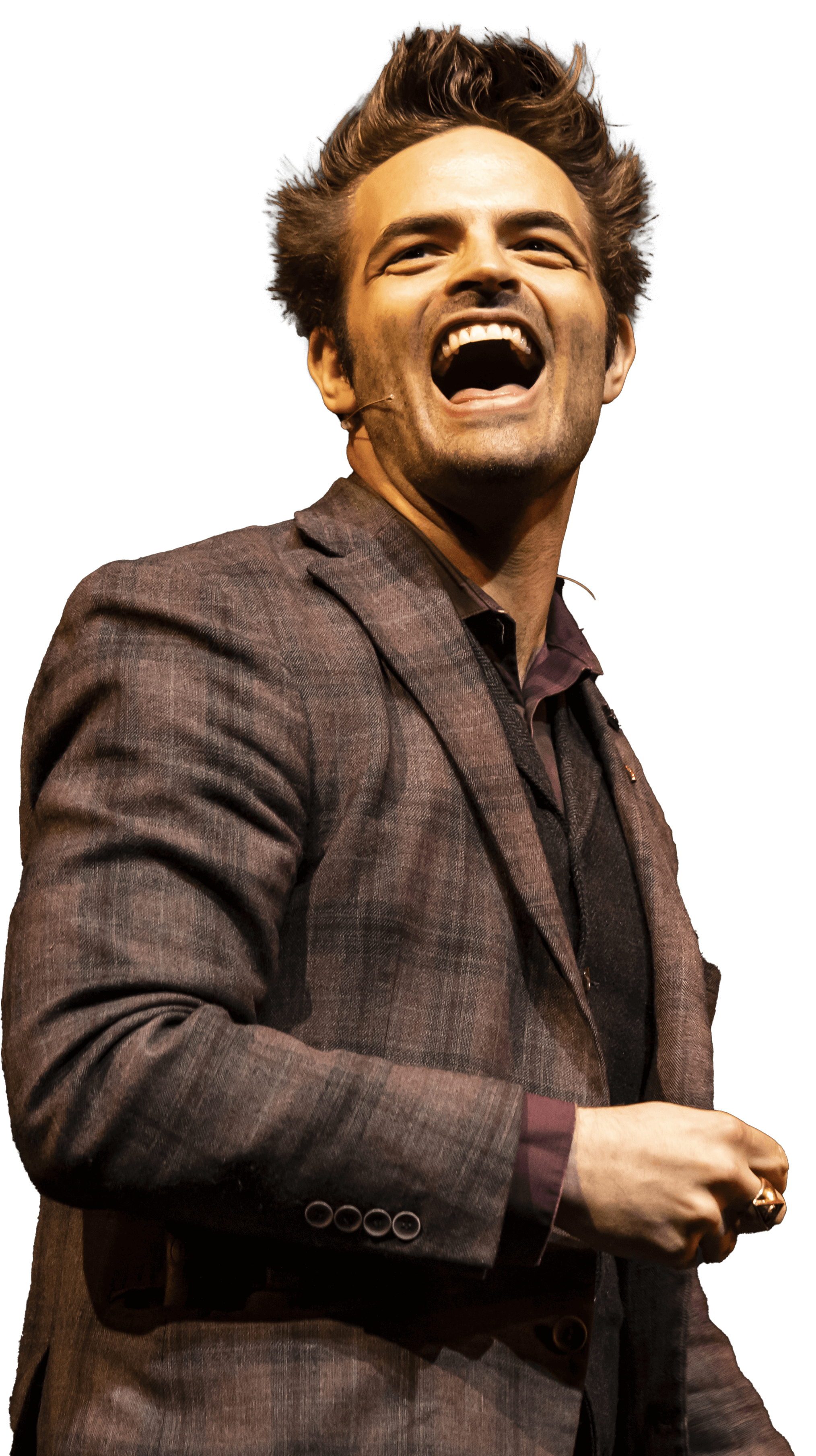 Kent Axell laughing on stage